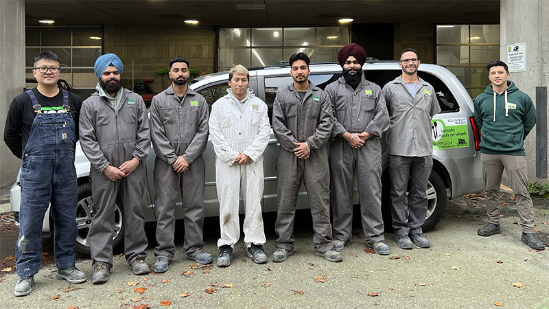 Automotive collision students and instructors