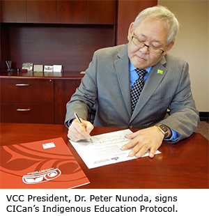 VCC President Dr. Peter Nunoda signs CICan's Indegenous Education Protocol
