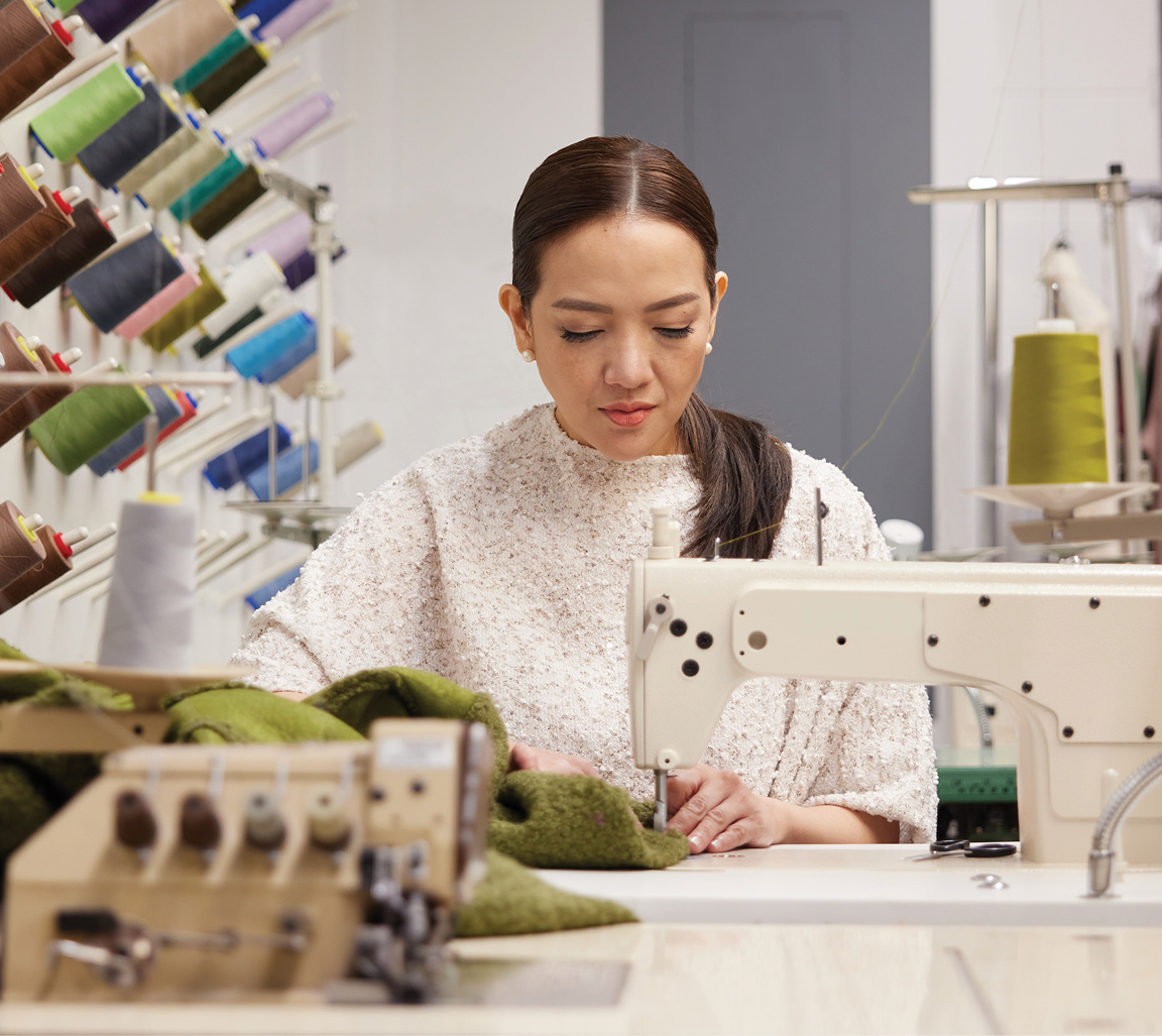 fashion student using a sewing machine