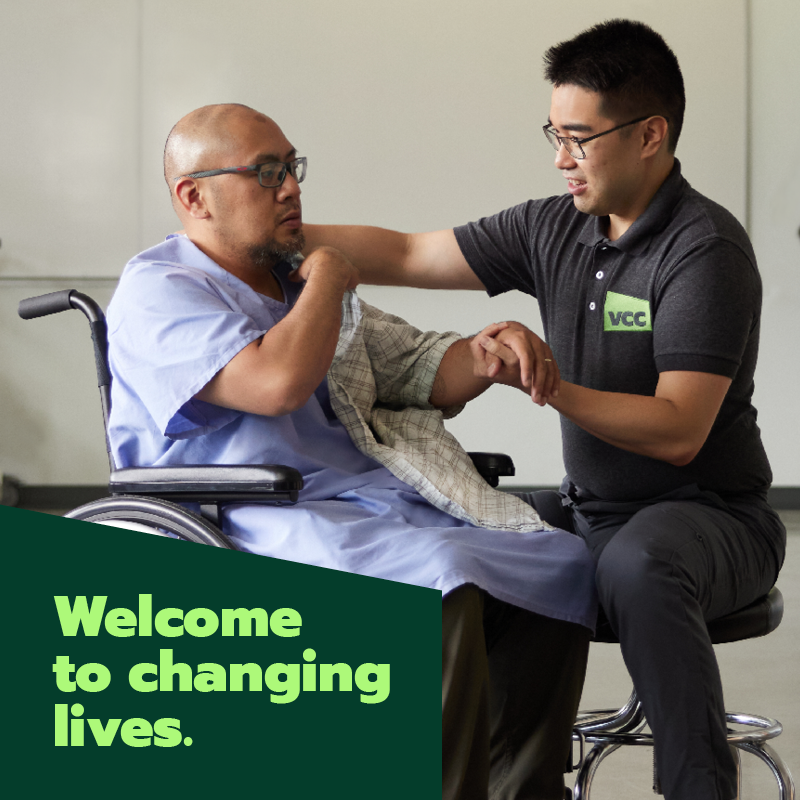 occupational physical therapist helping patient in  a wheelchair