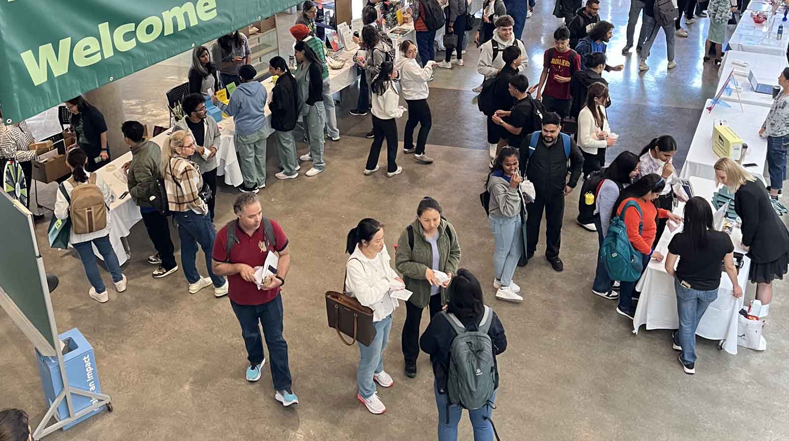 students gathered in an event space